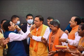 BJP leaders Prahlad Joshi, Pushkar Singh Dhami, Kailash Vijayvargiya and others celebrate the party's victory in the Uttarakhand Assembly elections, in Dehradun.