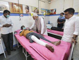 Prime Minister Narendra Modi meets the injured in the Morbi bridge accident at the hospital