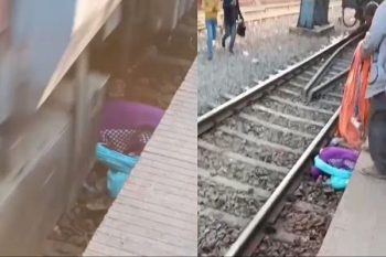 While boarding the train at the railway station, a woman fell down with two children, the train passed over her