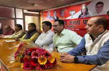 Party's state general secretary Mahesh Sharma joins BJP