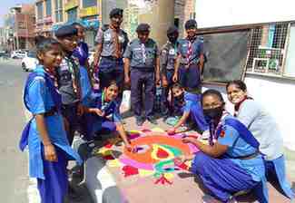 Scout guide took resolution for voter awareness by making rangoli