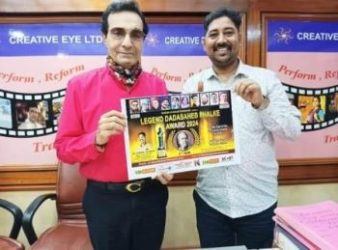 Director Dheeraj Kumar unveils the poster of the legend Dadasaheb Phalke Award 2024 ceremony.