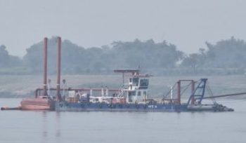 Dredging work in the Ganga River