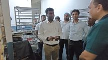 Ranchi DC, Mr. Manjunath Bhajantri, inspects units receiving hand-holding support under the PMFME scheme, facilitated by the Chief Minister's Small and Cottage Industries Development Board.