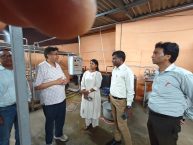 Ranchi DC, Mr. Manjunath Bhajantri, inspects units receiving hand-holding support under the PMFME scheme, facilitated by the Chief Minister's Small and Cottage Industries Development Board.